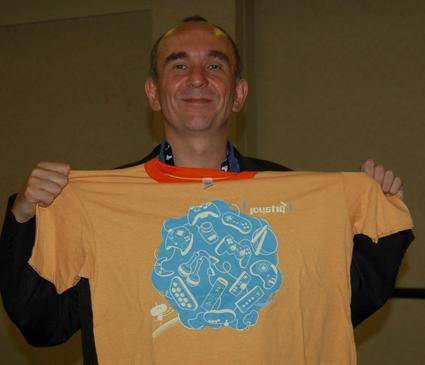 (Peter Molyneux showing his Joystiq T-shirt)